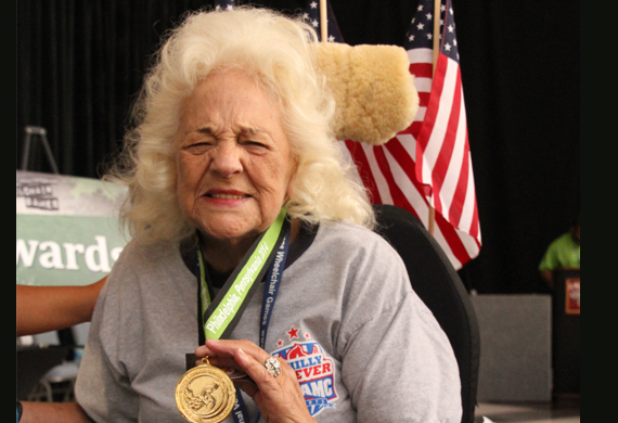 image of Doris Merrill shows her wheelchair games medal
